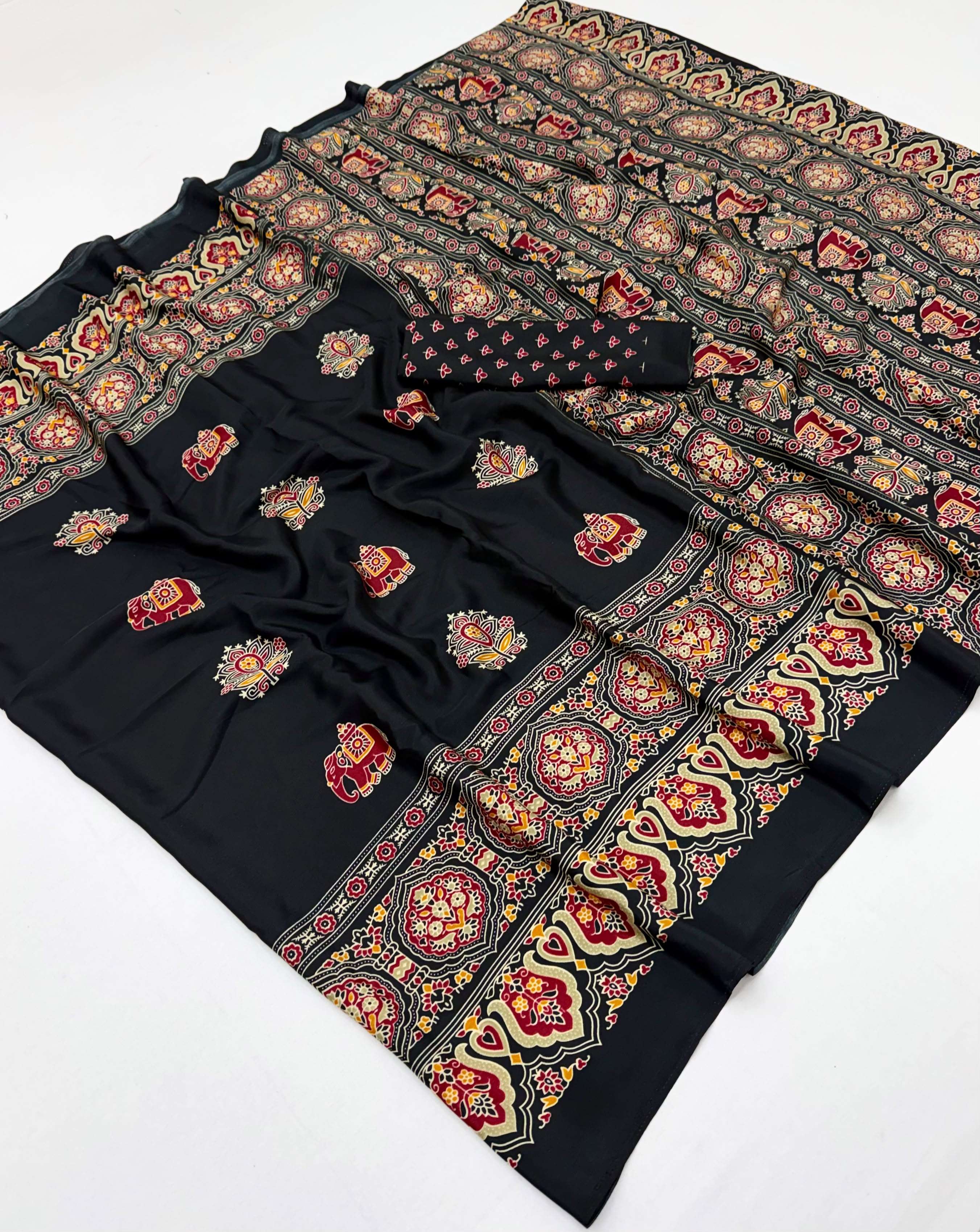 Ajrakh Luxe beautiful and elegant Printed ajrakh satin crepe fabric party wear saree reseller in surat Ajrakh Luxe beautiful and elegant Printed ajrakh satin crepe fabric party wear saree reseller in surat